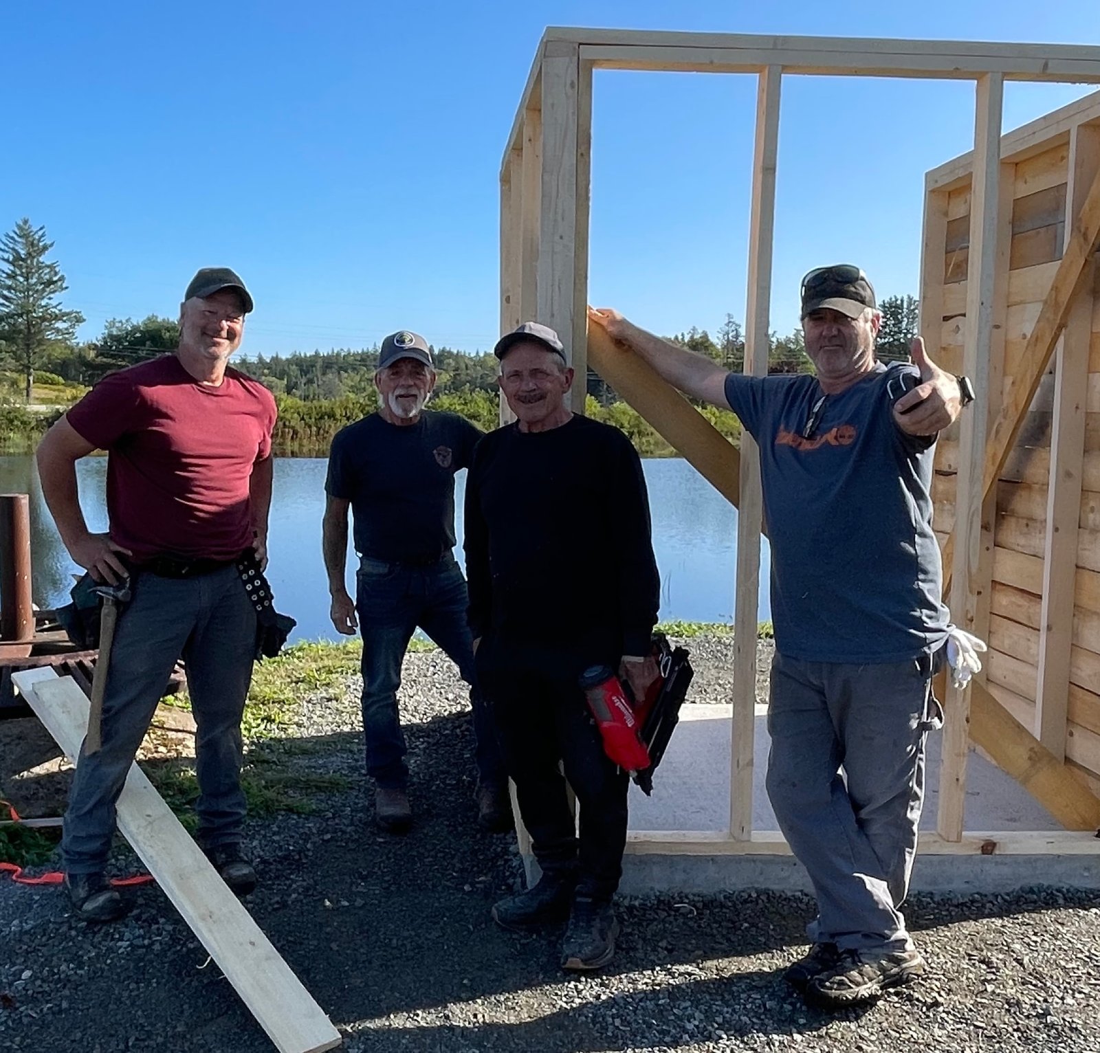 Four Bangor Museum Committee volunteers at the build site