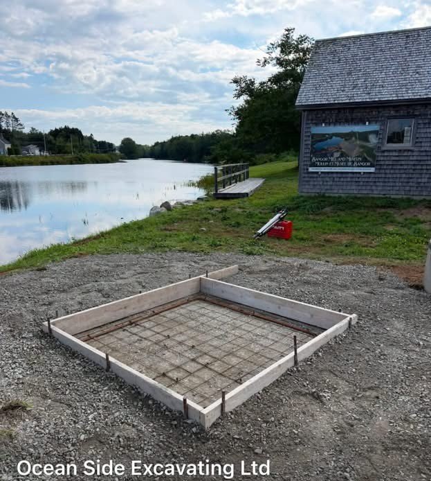 Prepared concrete foundation beside the water for the Clare Wind Phone